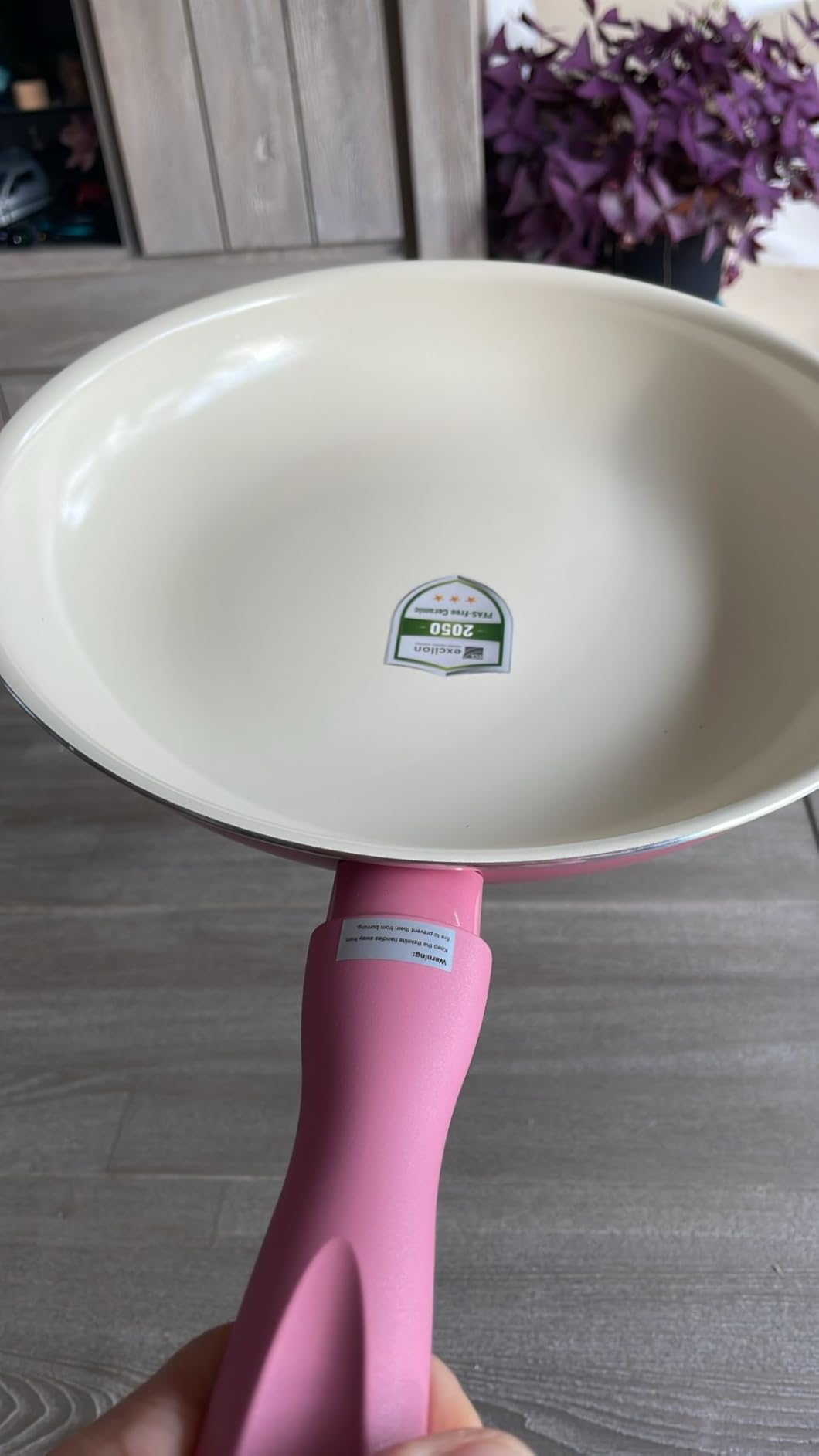 Ceramic interior of the pink frying pan
